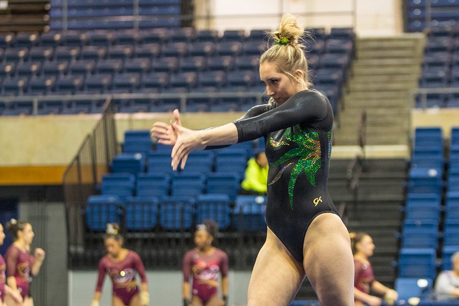 Sacramento State freshman gymnast Tara Catour performs her floor routine Jan. 29 at UC Davis. (Photo by Matthew Nobert)