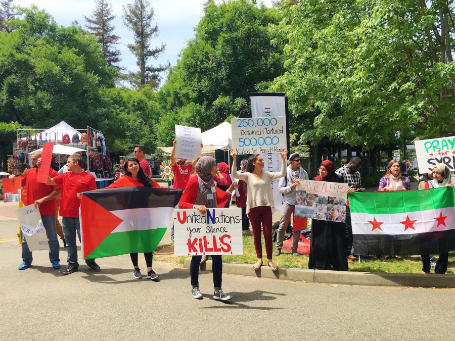 Aya Khalifeh at an on-campus protest against the bombings in Aleppo. (Photo courtesy of Aya Khalifeh)