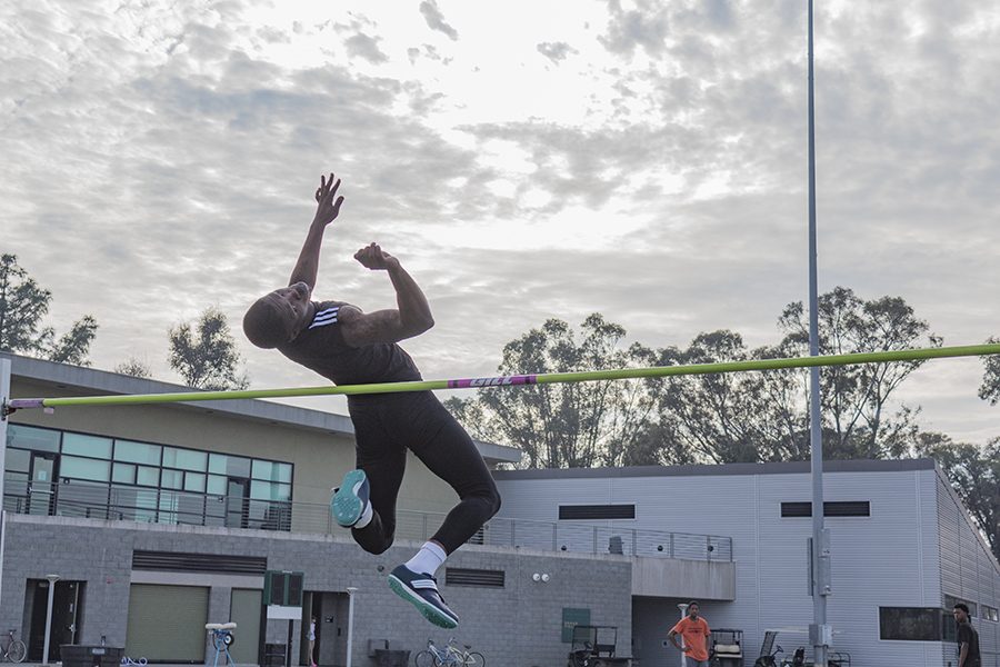 Sacramento State junior jumper Darius Armstead practices his high jump during practice on Feb. 15 at Hornet Stadium. Armstead is on the four-man squad of Sac State jumpers that finished the indoor season ranked fourth in the NCAA for track and field. (Photo by Matthew Nobert)