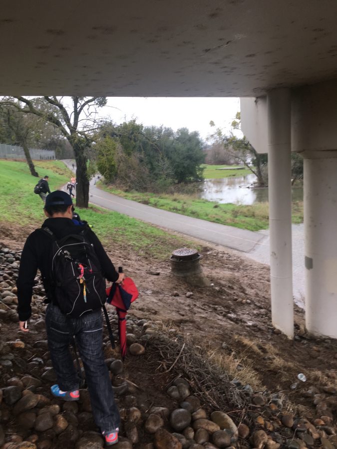 The American River flooded the bike trail causing students who live in the College Town area to hike the muddy, slippery hill in order to get to class on Wednesday morning. 