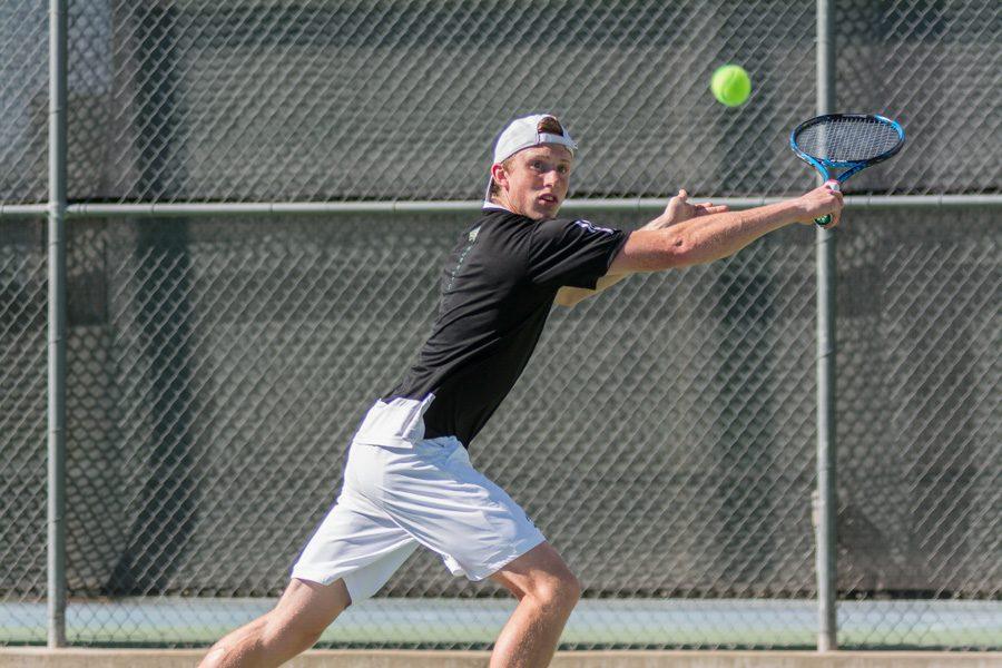 Sacramento+State+sophomore+Dom+Miller+backhands+the+ball+during+a+doubles+match+against+Grand+Canyon+in+the+Golden+State+Invite+Saturday+at+the+Sac+State+tennis+courts.+%28Photo+by+Matthew+Dyer%29