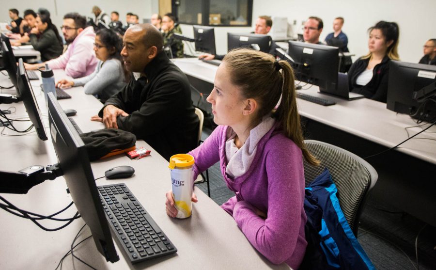 Business students listen in on their lecture during a Student Investment Fund meeting on Feb. 20. The meetings are held every Monday in AIRC 1013. (Photo by Letrice Fowler)