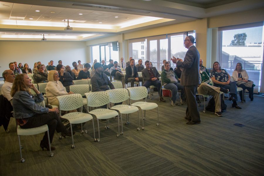 Oregon State University Deputy Athletic Director Mark Massari addresses Sacramento State students, faculty and alumni about his plans if hired as the new athletic director of the university at Terrace Suite in The WELL. (Photo by Nicole Fowler)