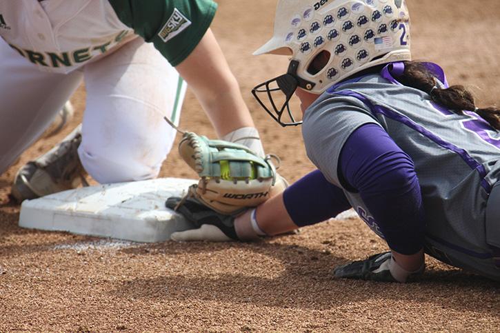 Weber State junior infielder McKinley Brinkerhoff safely reaches base against the Sacramento State softball team Saturday at Shea Stadium. (Photo by Barbara Harvey)