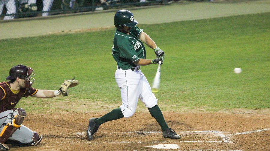 Sacramento State junior Vinny Esposito swings and makes contact with the ball against Minnesota Friday at John Smith Field. (Photo by Andre Newell)