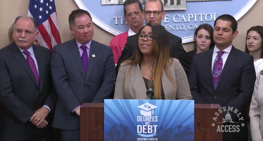 Sacramento State senior Monique Graham speaks at a press conference at the Capitol building on Monday. Graham said she works 30 hours a week, and yet anticipates graduating with $40,000 in student loan debt. (Screenshot via Anthony Rendon / Twitter)