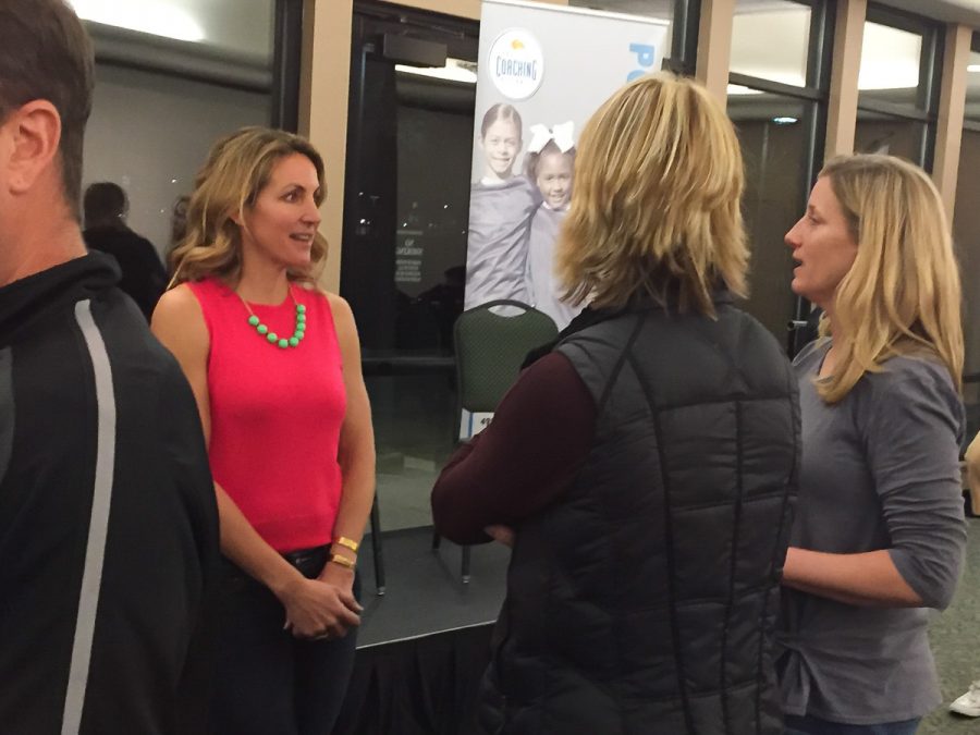Two-time Olympic gold medalist Summer Sanders, left, talks with parents of young female athletes Thursday at the Sac State Alumni Center. (Photo by Alec Romero)