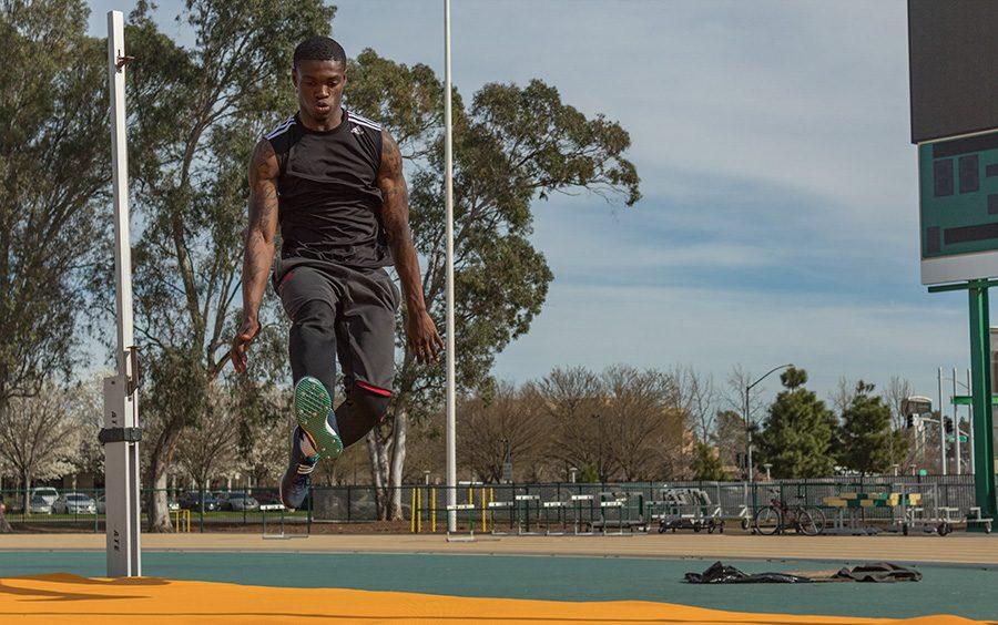 Sacramento State junior jumper Darius Armstead practices for high jump with some run throughs on March 10 at Hornet Stadium. Armstead is on the four-man squad of Sac State jumpers that finished the indoor season ranked fourth in the NCAA for track and field. (Photo by Matthew Nobert)