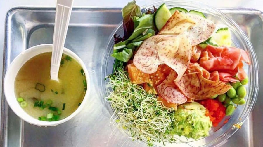 A bowl of miso sits next to a poke bowl. Customers will be able to build their own poke bowls as they move down the line. (Photo courtesy of Poke Noke)