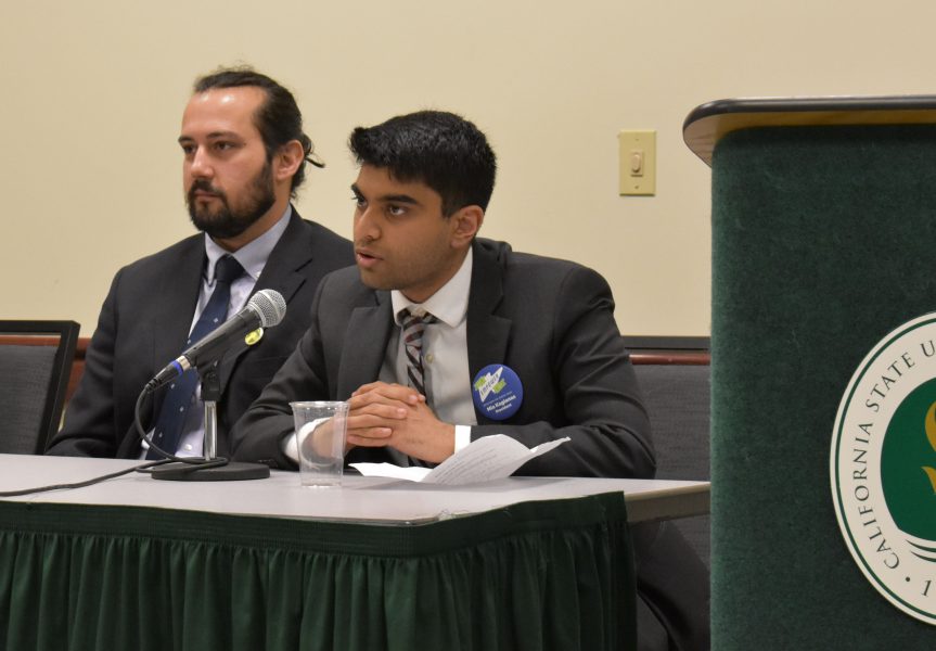 Director of Social Sciences and Interdisciplinary Studies candidates Danial McGhie, left, and Jay Passi, right, speak on campus at a Sacramento State ASI candidate forum on March 30 in the Forest Suite of the University Union. (Photo by Cassie Dickman)