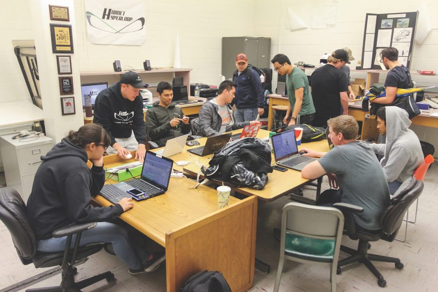 The Hornet Hyperloop team meets to discuss its pod's structural design on April 18 in Santa Clara Hall. The team will begin construction of the pod and project to finish in August. (Photo by Matthew Dyer)