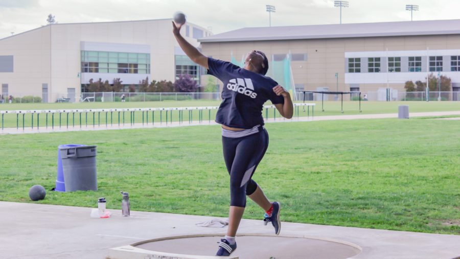 Sacramento State freshman thrower Morgan Jones practices her shot put during practice on April 12 at Hornet Stadium. Jones is one of four throwers who has helped Sac State become the 12th ranked team in the nation. (Photo by Andre Newell)