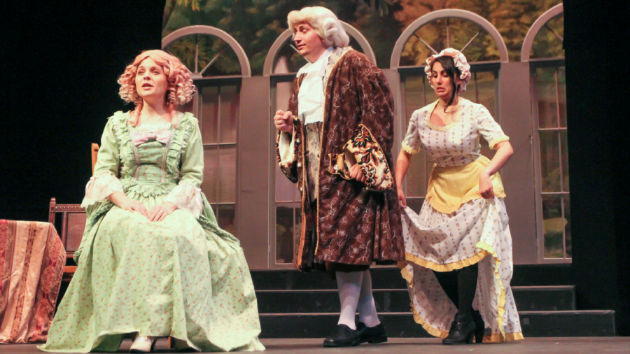 Justin Ramm-Damron, left, Gia Battista, center, and Tatiana Grabcuic, right, act out a scene in ‘Tartuffe.’ The opera will be performed in the University Theatre in Shasta Hall starting May 5 at 8 p.m. (Photo by Andre Newell)