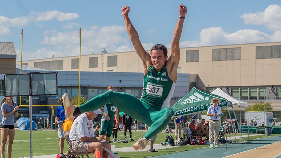 Sacramento State senior Michael Turner leaps in the air during the long jump event Friday in the Big Sky Conference Championships at Hornet Stadium. Turner won the long jump event with a leap of 25-08.00 to place him second in school history and ninth all-time in the Big Sky. (Photo by Matthew Nobert)