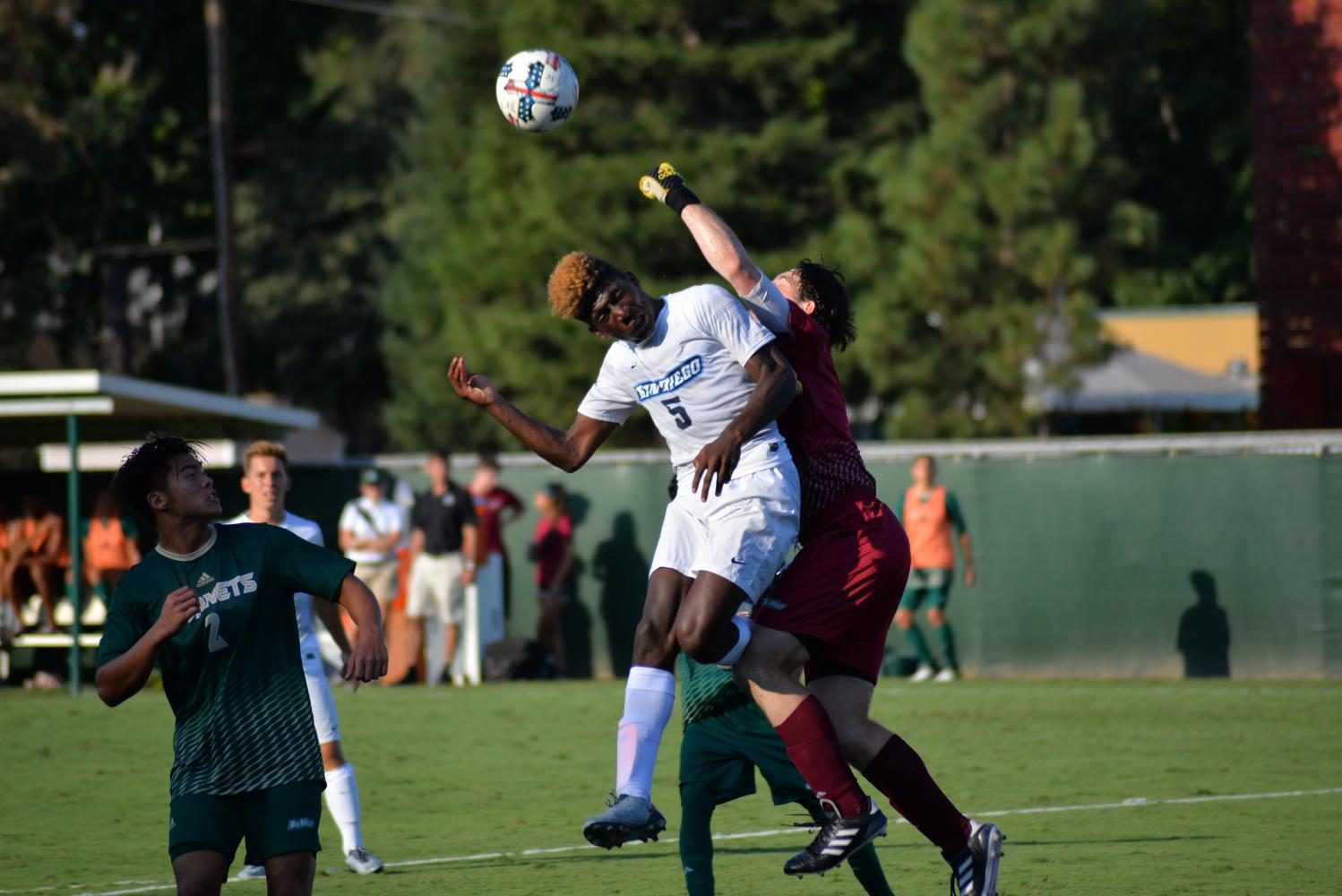 Sacramento State senior goalkeeper James Del Curto collides with University of San Diego junior defender Josiah Benjamin Friday, Sept. 8 at Hornet Field. 