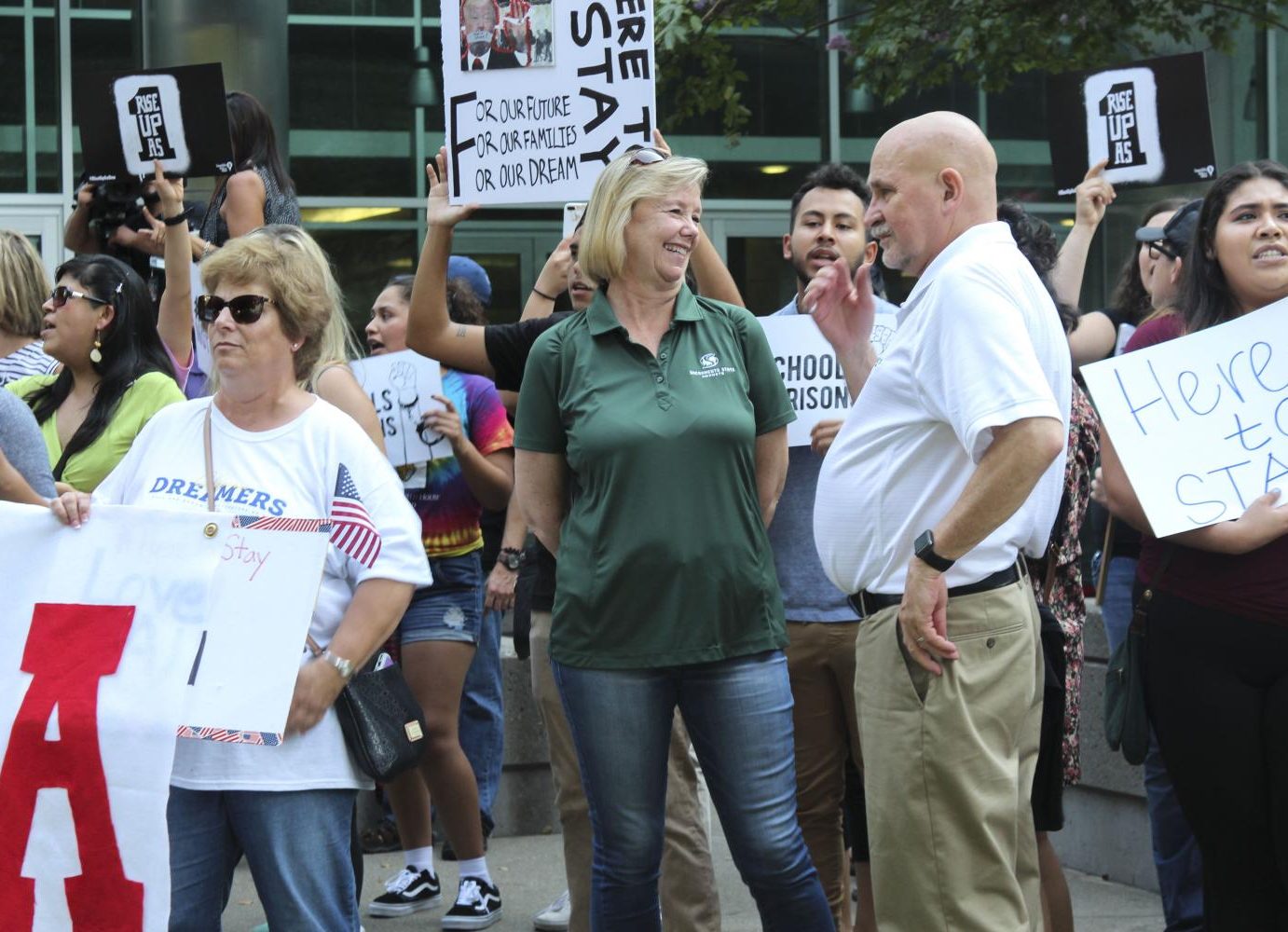 President Robert Nelsen and his wife Jody show their support for DACA recipients at the march in downtown Sacramento on Tuesday. (Photo by Claire Morgan)