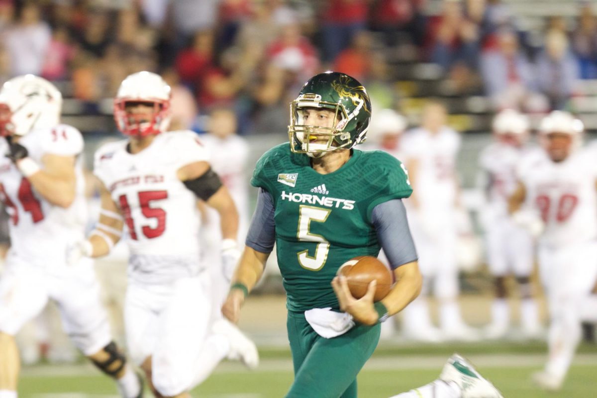 Sacramento State junior quarterback Kevin Thomson races down the field for a 59-yard rushing touchdown against Southern Utah Sept. 23 at Hornet Stadium. Thomson finished with 14 carries for 149 yards and four touchdowns.