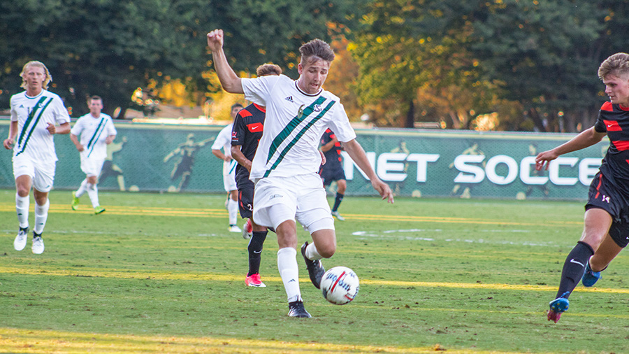 Sacramento State freshman forward Justin Bedig gets control of the ball as he works downfield against the University of the Pacific Aug. 26 at Hornet Field. Bedig is one of 10 freshmen to join the team this season.