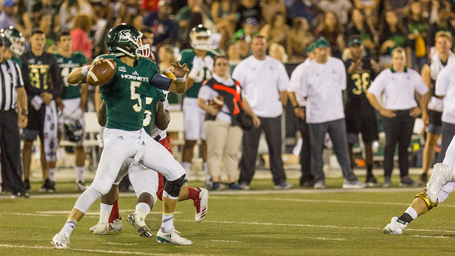 Sacramento State junior quarterback Kevin Thomson sets in the pocket to throw the ball downfield during the Hornets home opener against the University of Incarnate Word Sept. 9 at Hornet Stadium.