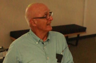 Jon Else signs a copy of his new novel, “True South” in the Library Gallery on Wednesday.