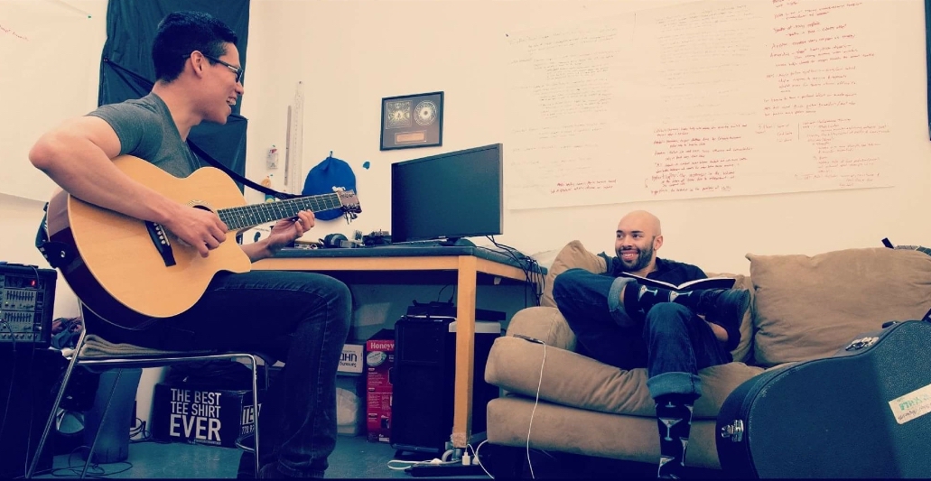Sacramento State photography professor Steve Berroteron (left) and fellow band mate Sid Pierce (right) practicing guitar and writing material for Super NintenBros.