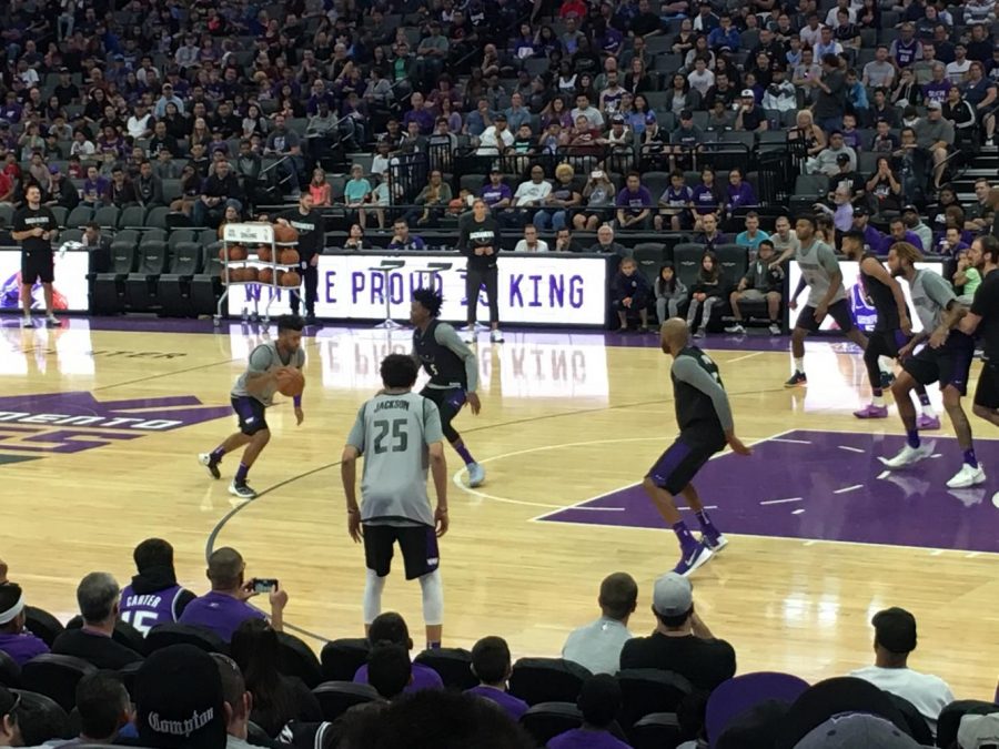 Sacramento+Kings+guard+Frank+Mason+III+dribbles+the+ball+against+guard+De%E2%80%99Aaron+Fox+during+a+friendly+pickup+game+at+Fan+Fest+on+October+18%2C+2017.+