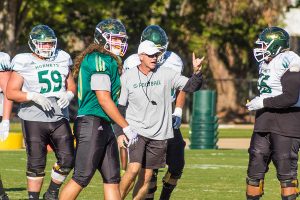 Sacramento State head football coach Jody Sears instructs his players during practice Sept. 20 at the Sac State practice field. After defeating North Dakota 34-27 on Oct. 22, 2017. Sears was fired Monday.