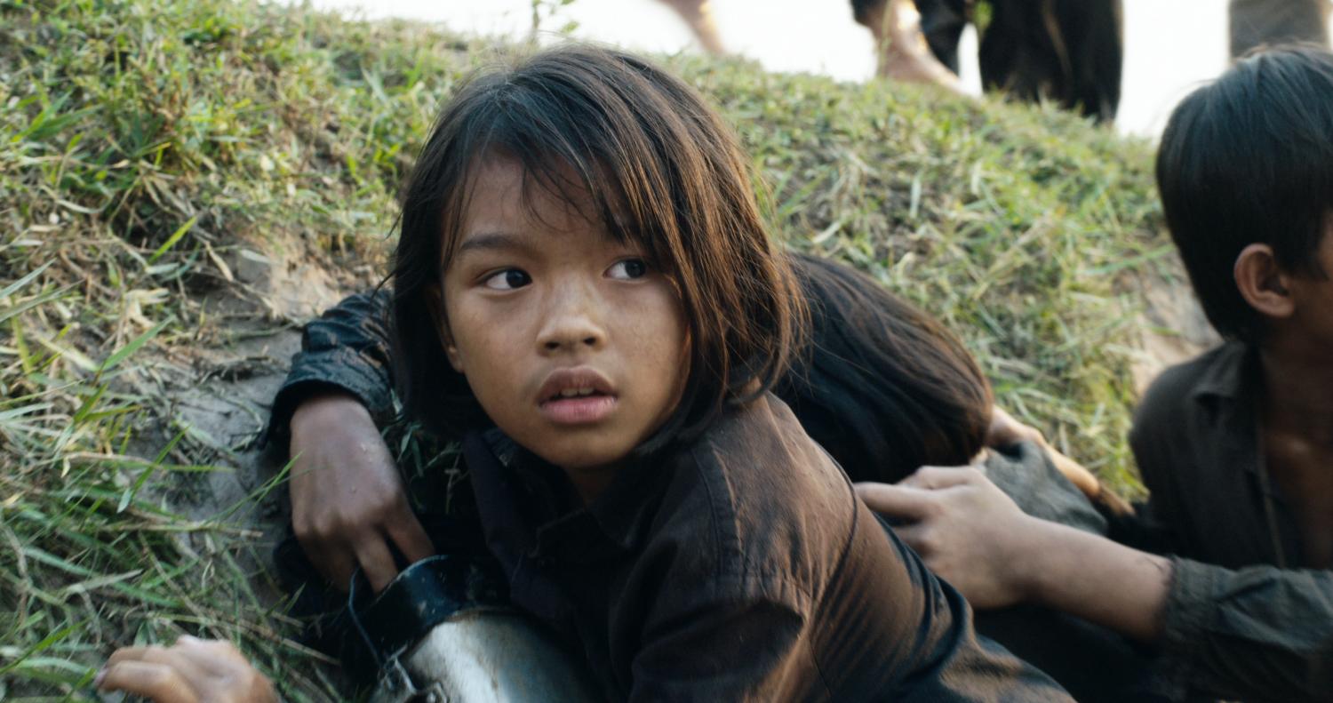 Making her on-screen debut, 9-year-old Sreymoch Sareum portrays Loung Ung in