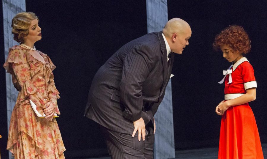 From left to right, Melissa Brausch, Alexander Escorcia and Isabella Hernandez star in “Annie,” the final production of the fall season for the Department of Theatre and Dance. The musical will run from Nov. 29-Dec. 10 at the University Theatre.