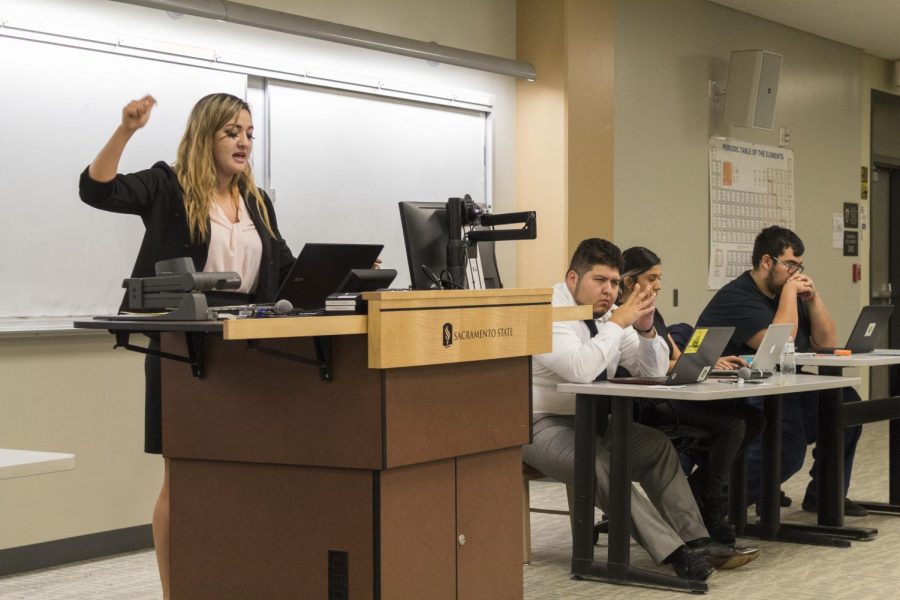 Senior Kelly Buckland delivers her argument for the negative team about how college tuition should not be free at CSUs during the Public Debate Associations fall public debate on Nov.16 at Sacramento State. The negative won the debate that students should pay for tuition.