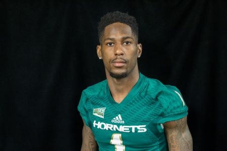 Sac State football senior tackles adversity, makes history