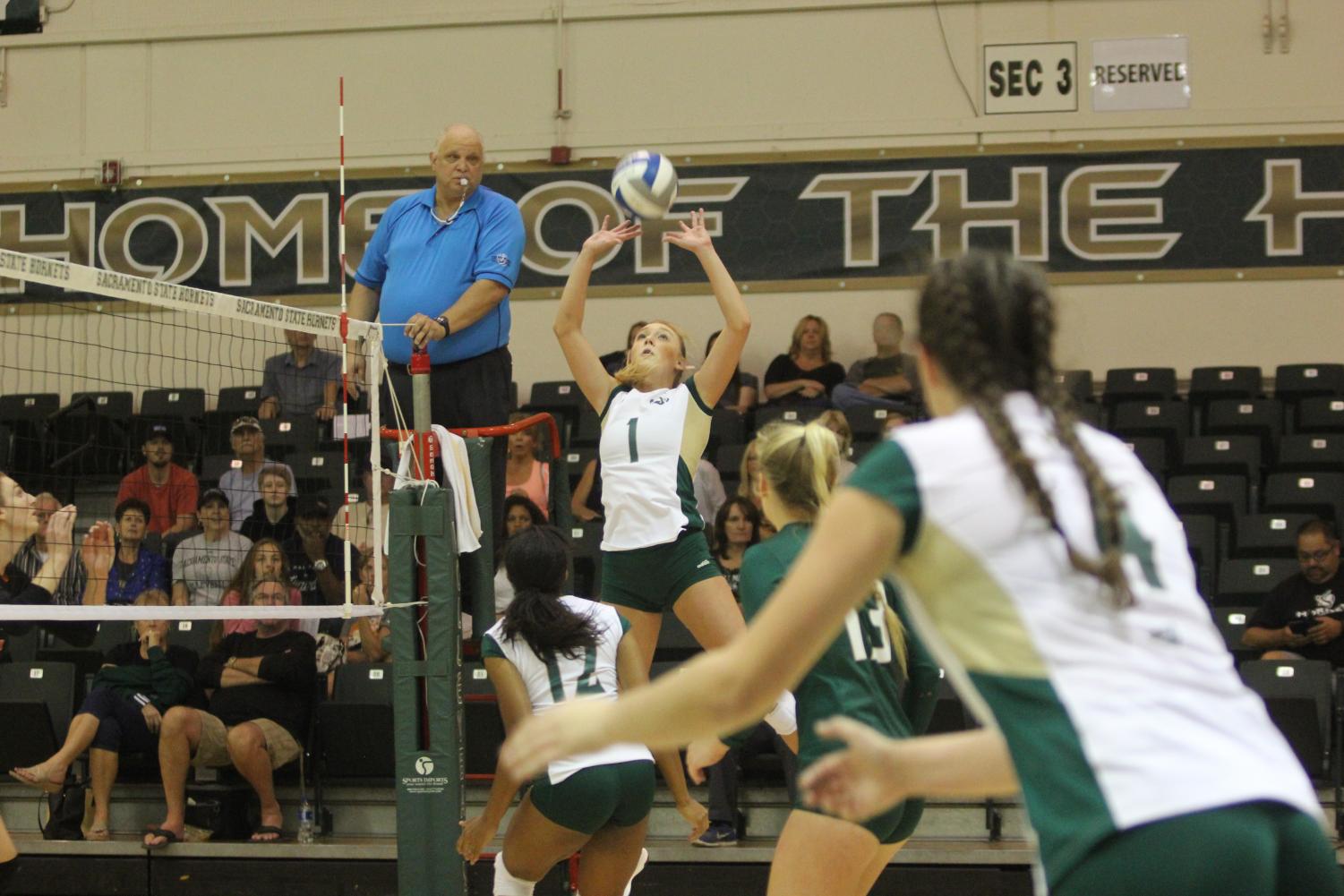 Sacramento State senior setter Kennedy Kurtz sets the ball to junior middle blocker Brie Gathright against Idaho State at Colberg Court in the Nest on Saturday, Sept. 23, 2017. The Hornets will host the Big Sky Tournament and put their 24 consecutive conference home-game winning streak on the line from Thursday to Saturday.