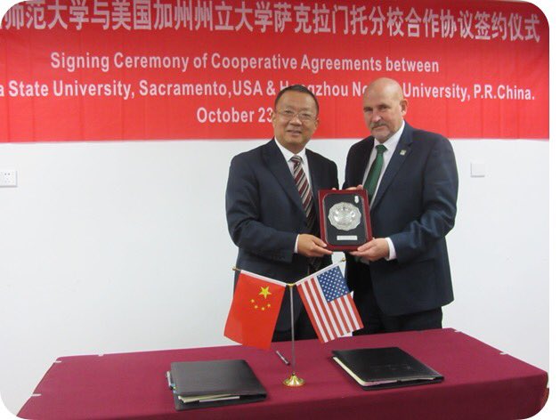 Sacramento+State+President+Robert+Nelsen%2C+right%2C+poses+with+the+president+of+Hangzhou+Normal+University%2C+Ye+Gao+Xiang%2C+after+agreeing+to+three+exchange+programs.