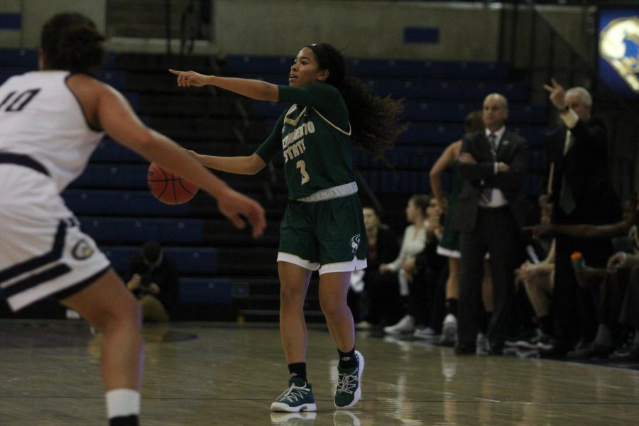 Sacramento State sophomore guard Tiara Scott directs her teammates in a 79-72 loss against UC Davis Thursday, Nov. 30 at The Pavilion in Davis.