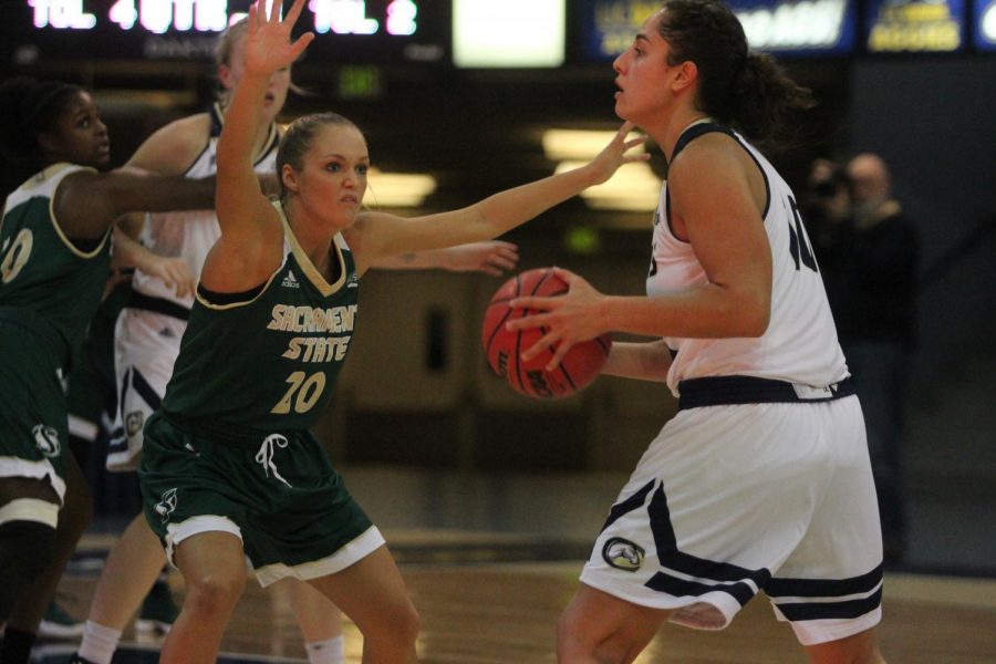 Sacramento State junior forward Raegan Rohn guards UC Davis senior forward Pele Gianotti at The Pavilion in Davis on Thursday, Nov. 30, 2017. The Hornets lost 79-72 against the Aggies. 