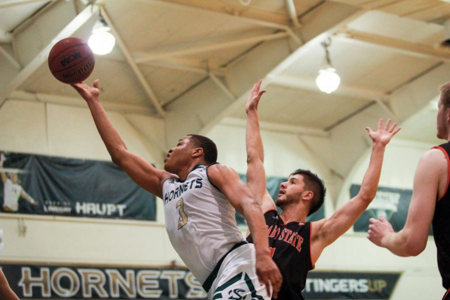 Sacramento State senior forward Justin Strings shoots a layup against Idaho State Thursday, Feb. 15 at the Nest. Strings finished with 24 points in a 67-64 loss to the Bengals. 