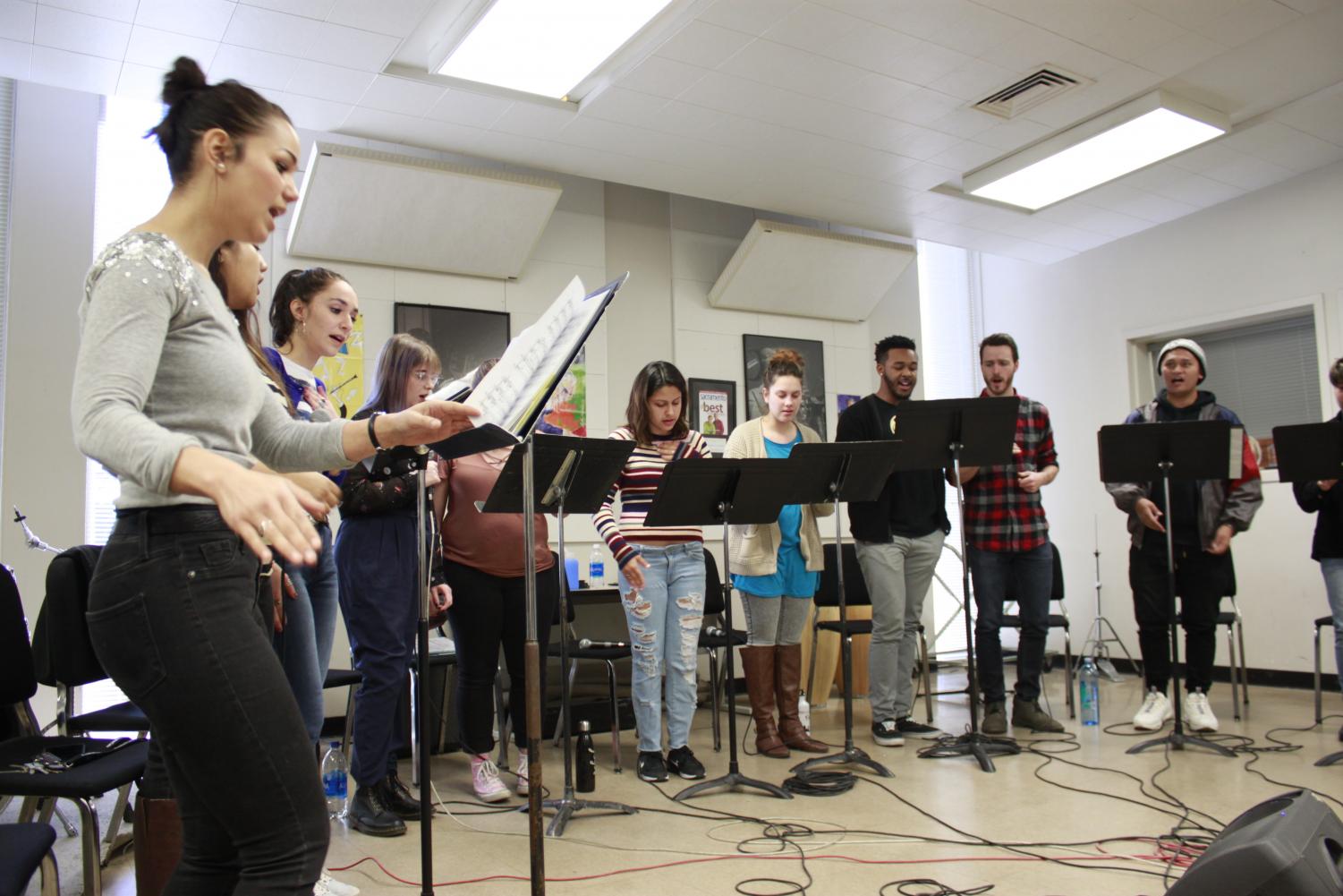 Students of the vocal jazz groups C-Sus Voices and Vox Now rehearse together in preparation for their upcoming performance. The groups will be performing at the Third Annual MOSAIC: Gala Concert on Sunday, March 4.