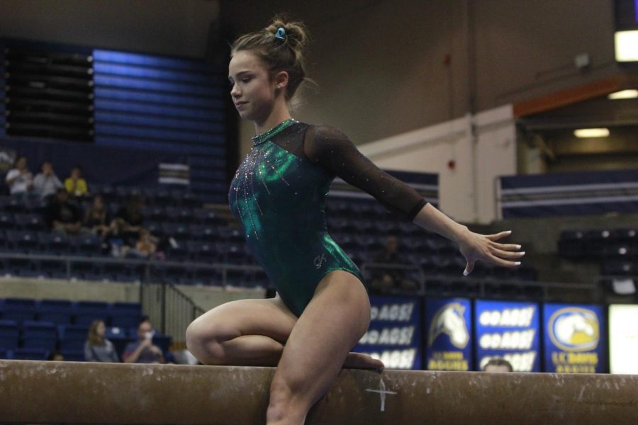 Sacramento State junior Lauren Schmeiss competes on the balance beam at UC Davis on Friday, Feb. 9, 2018. Schmeiss recorded a 9.700 and has also finished with scores of 9.700 or higher in five of her seven events this season.