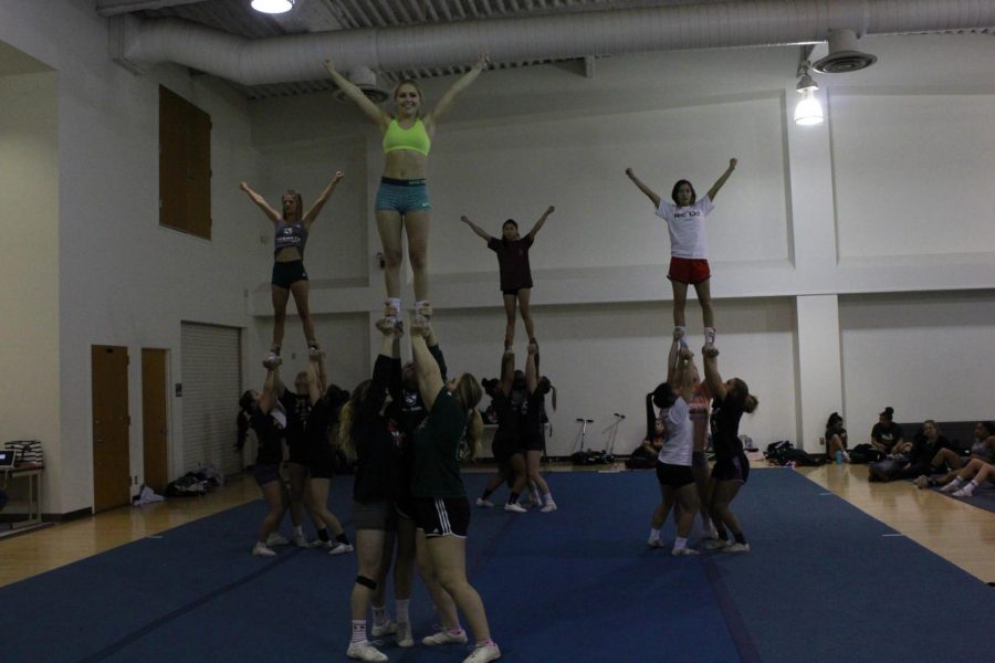 Members of the Sacramento State STUNT team finish a routine during practice at Solano Hall on Tuesday, Feb. 20, 2018. Last season, Sac State placed second in the NCAA Division I Nationals.