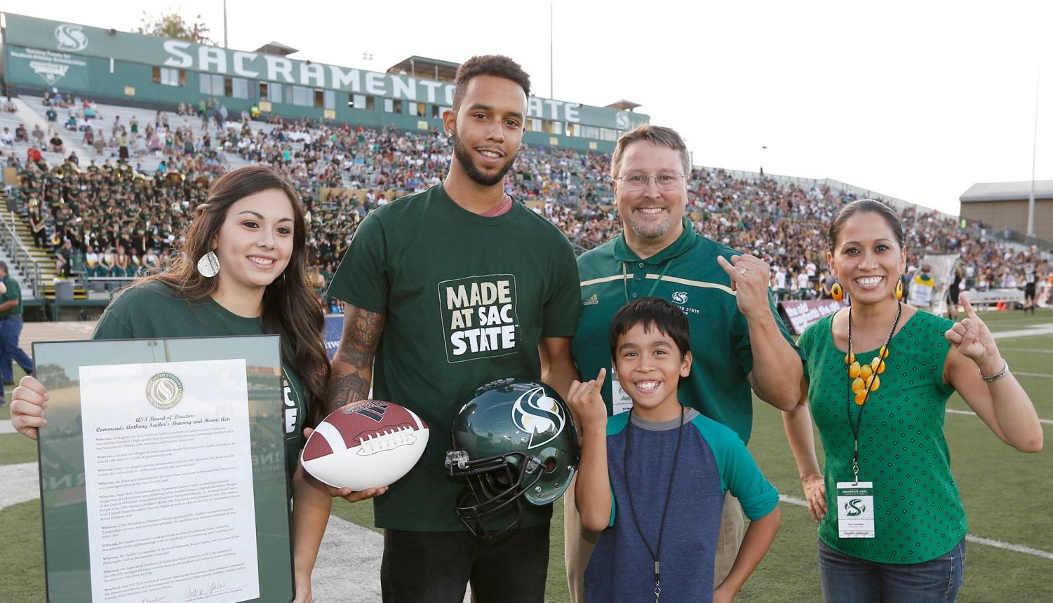 Anthony Sadler poses at Hornet Stadium on Sept. 26, 2015. After Sadler and two friends helped stop a terrorist on a train from Amsterdam to Paris, the three men play themselves in a film directed by Clint Eastwood.