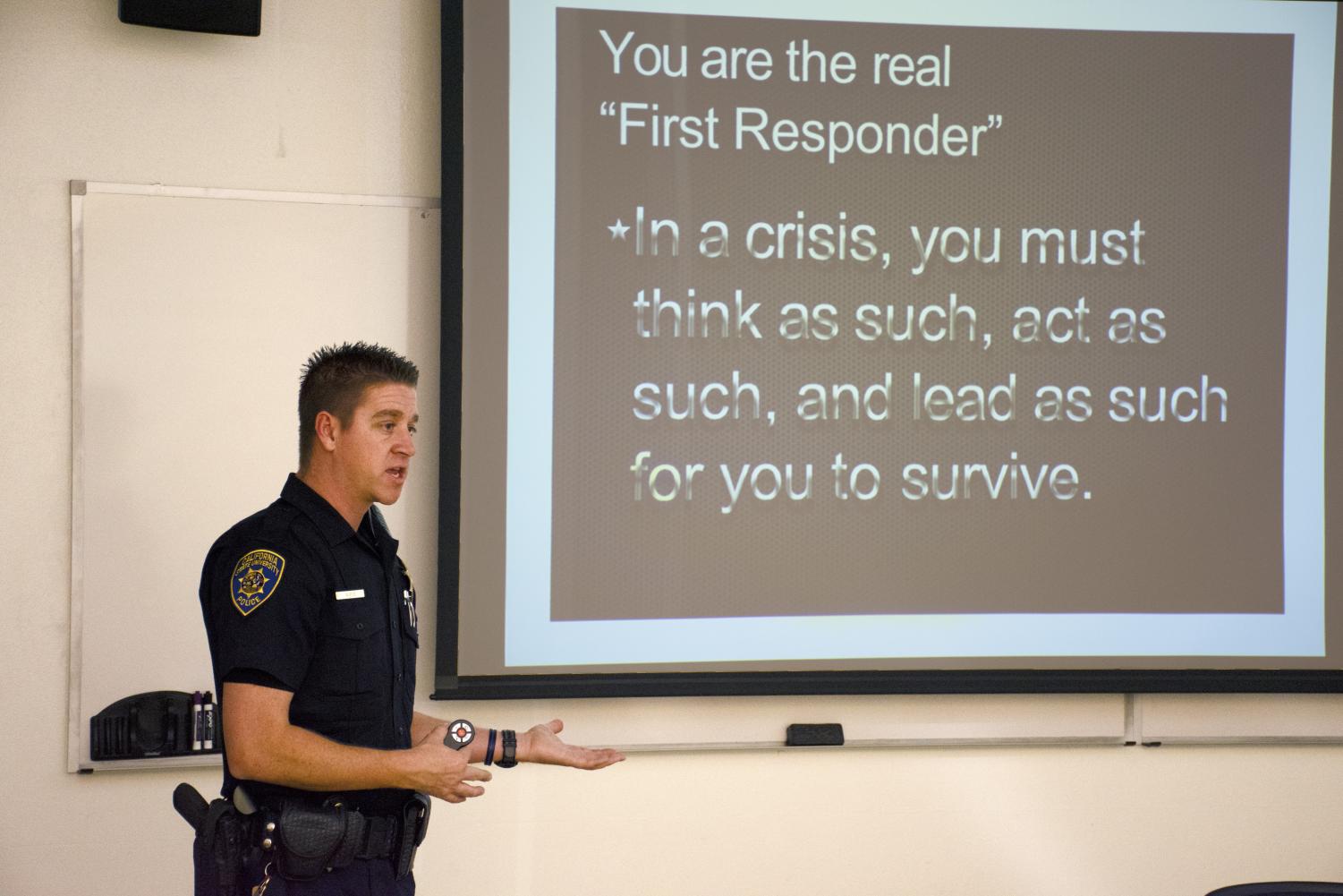 Community Outreach Officer Nathan Rice conducts an active shooter training in Eureka Hall on March 9, 2018. Active shooter trainings are being offered in response to an increase of school shootings.