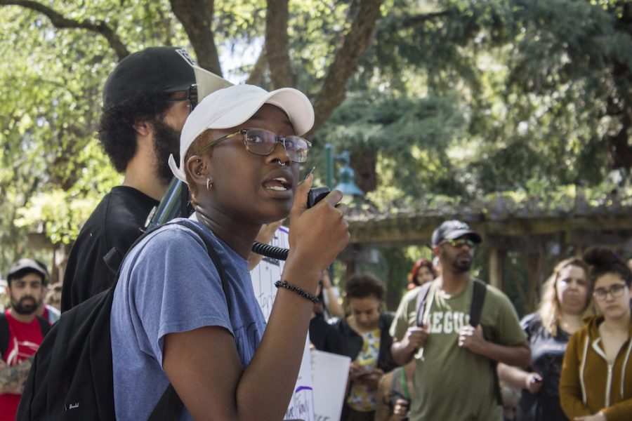 Sacramento State sophomore Jaelyn Singleton speaks to a group gathered at the Library Quad during a Black Lives Matter rally on Tuesday, April 3 regarding the police-involved shooting of Stephon Clark in March. Singleton was the first of several students, faculty and other demonstrators to voice their concerns and opinions toward an audience of people which included Sac State President Robert Nelsen. 