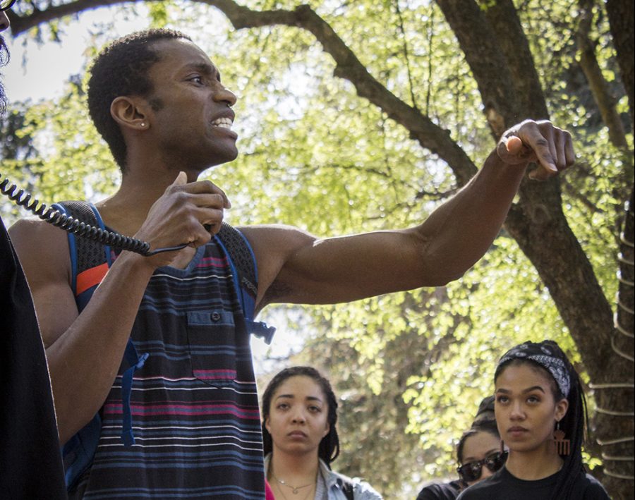 Sacramento State student Corey Hopkins speaks to a group gathered at the Library Quad during a rally on Tuesday, April 3 regarding the police-involved shooting of Stephon Clark in March. Hopkins was one of several students, faculty and other demonstrators to voice their concerns and opinions toward an audience of people which included Sac State President Robert Nelsen.