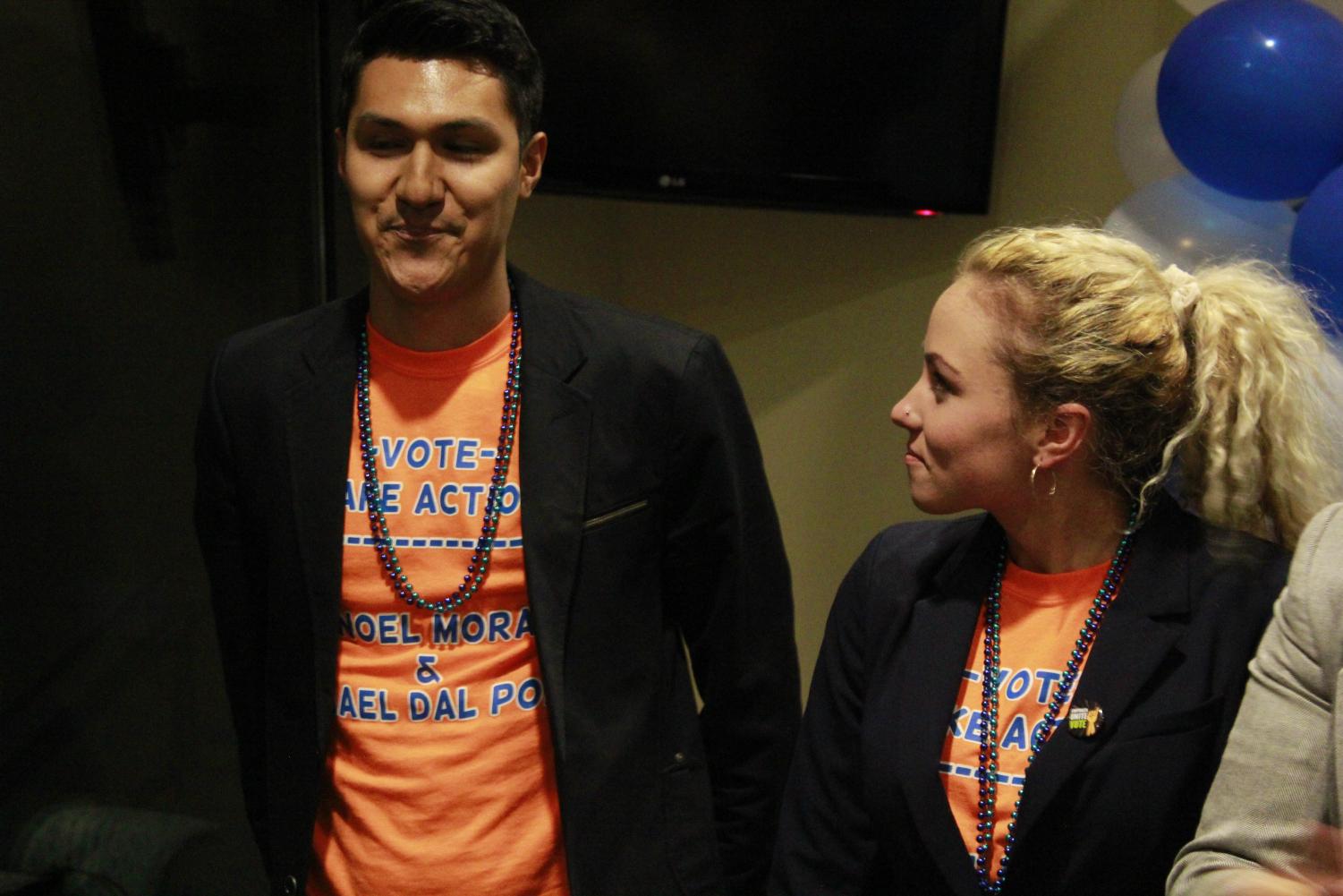 Noel Mora and Rachael Dal Porto as they hear the results of the ASI elections on April 11, 2018, at the elections party. The president's ticket, consisting of the two candidates, ran unopposed for the president and executive vice-president positions.
