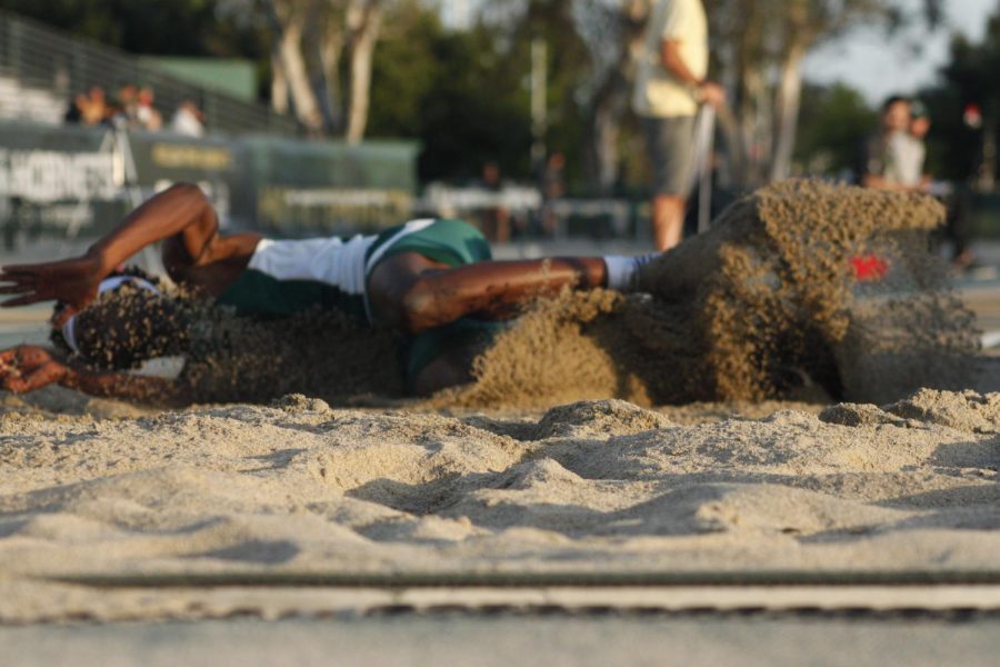 Sacramento State sophomore Jah Strange lands in the triple jump pit before finishing in second place in the Causeway Classic Duel against UC Davis at Hornet Stadium on Friday, April 28, 2018. Strange also earned a personal best of 24-11.75 for first place in the long jump.