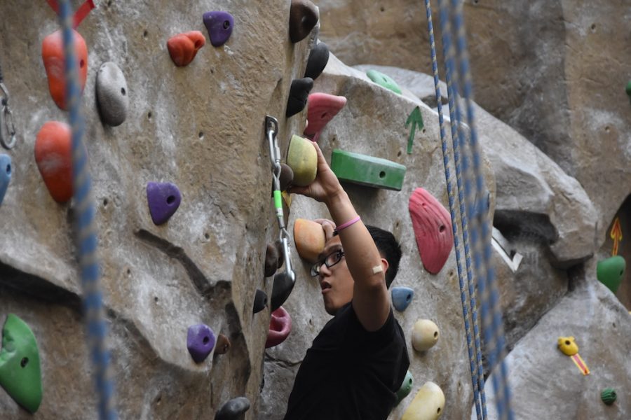Ethan Veslenio, who joined the rock climbing club this semester, scales a rock wall in the WELL on Thursday, May 3. Sac States rock climbing club was voted in as the best sports/recreation club on campus for the Best of Sac State.
