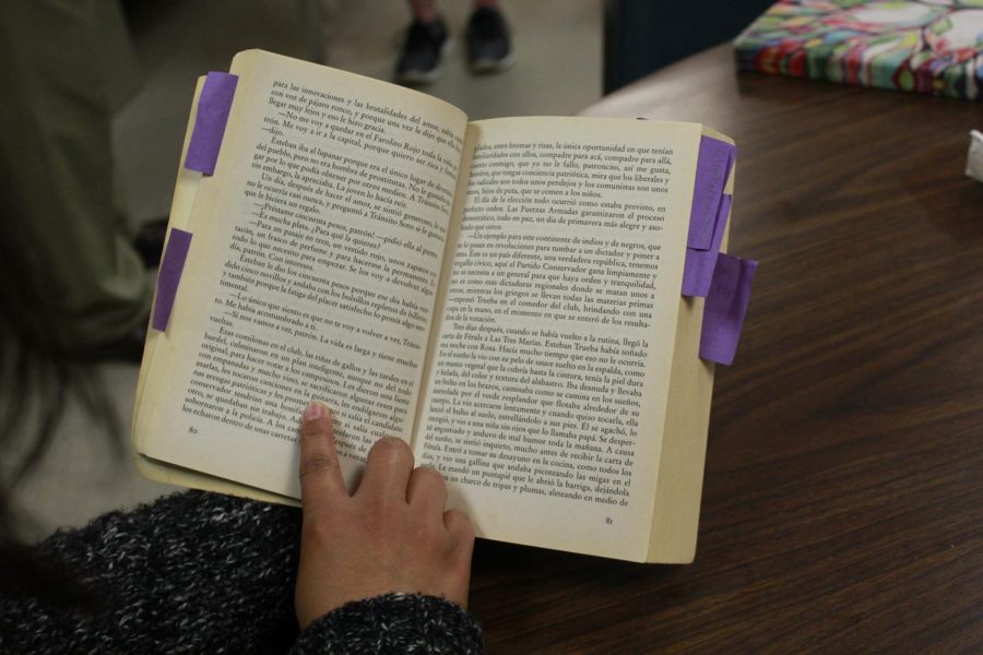 Fourth-year Spanish minor Stephanie Hernandez reads from her assigned books, La Casa de Los Espiritus, for one of her five Spanish classes this semester. Spanish won Best Language in this years Best of Sac State poll.