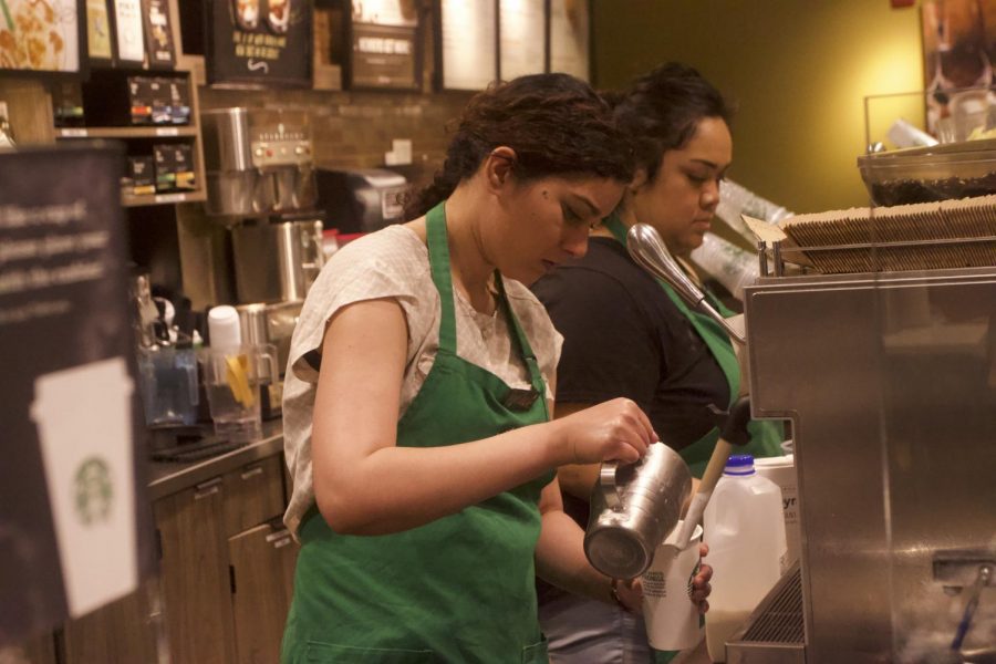 Barista preparing drink