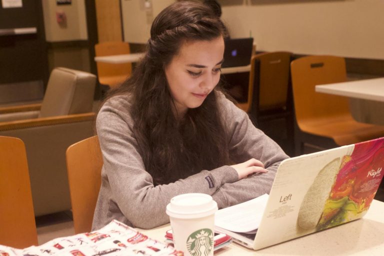 Student studying at Starbucks