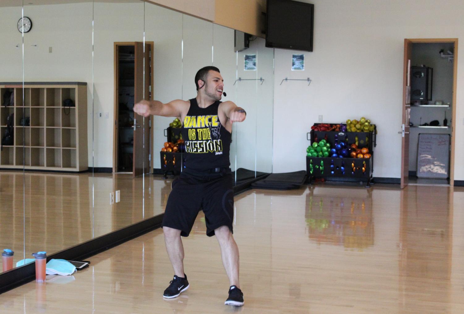 Alex Zamora instructs his Zumba class on the second floor of The WELL on May 1, 2018. Zumba was chosen by students as the best fitness class taught at The WELL in The State Hornet’s Best of Sac State 2018 survey.